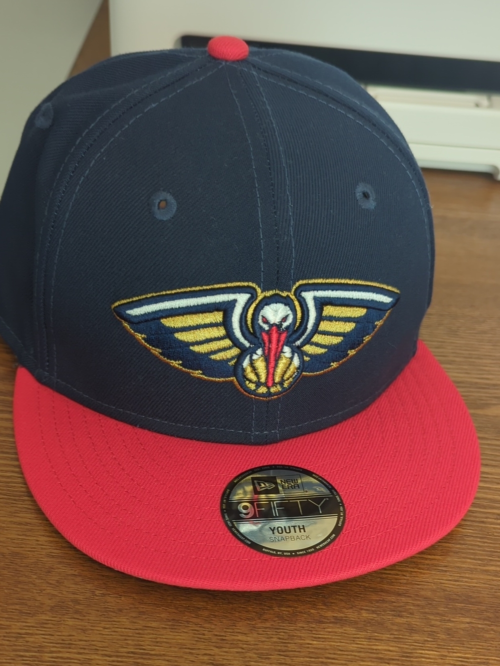 New Era YOUTH Navy and Red Pelicans Snapback Hat